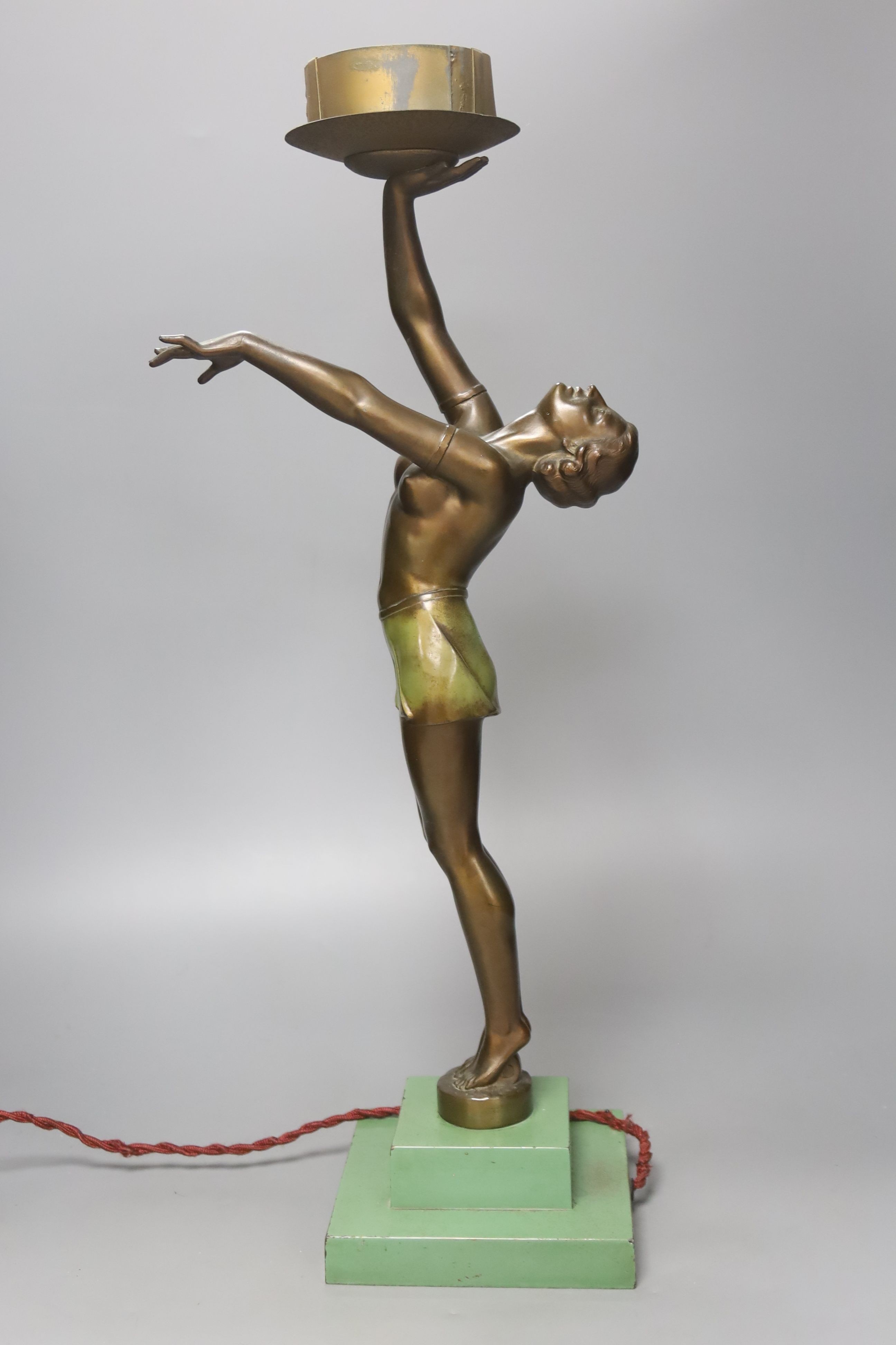 An Art Deco patinated spelter figural lamp, overall height 50cm